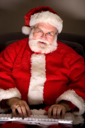 The REAL Santa Claus, working on eProductivity on his Mac computer